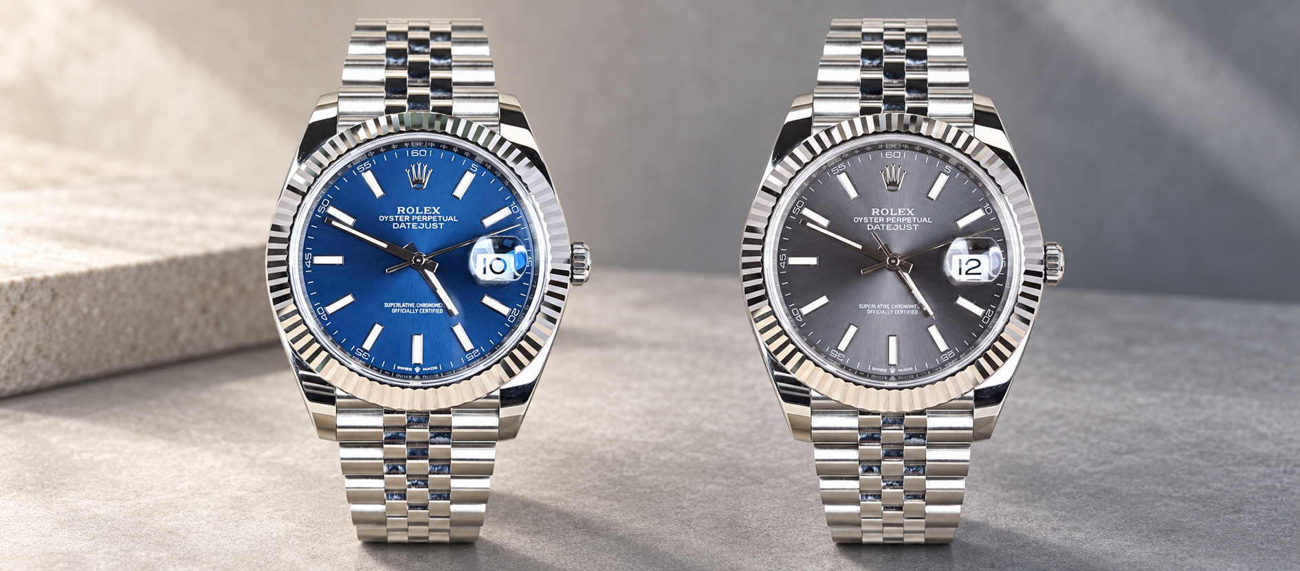 Bright blue and slate dial Rolex Datejust 41 reference 126334 watches with fluted bezels and stainless steel Jubilee bracelets side by side