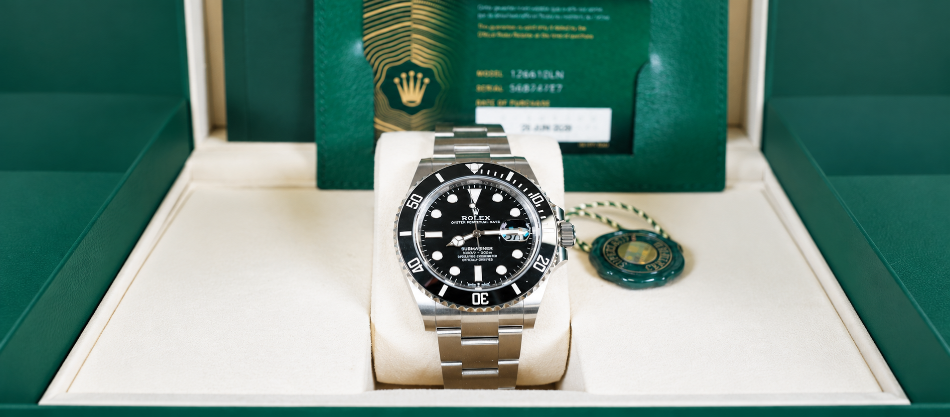 Rolex Submariner Date 126610LN with black dial and Oyster bracelet displayed in its presentation box